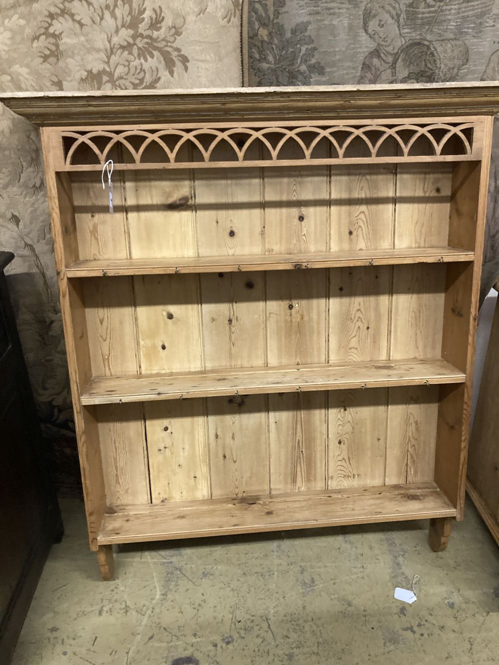 A Victorian pine dresser base, together with a panelled pine plate rack, base width 107cm, depth 50cm, height 80cm